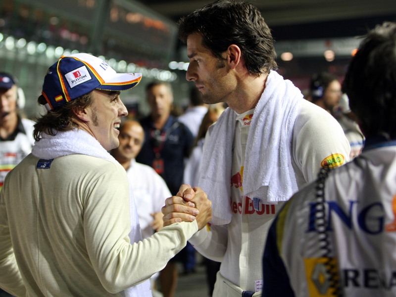 1245063665mark webber i fernando alonso ot red bull